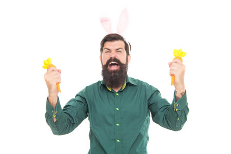 happy easter man in rabbit ears ready for bunny hunt holding carrot, easter