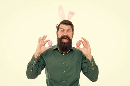 Culture customs and traditions. Easter bunny delivering colored eggs. Seasonal goods. Celebration of...