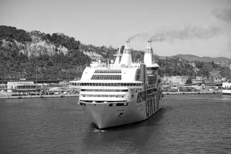 Barcelona, Spain - March 30, 2016: cruise ship GNV Rhapsody Genova in harbor. Cruise ship destination trip. Summer vacation and holiday. Travelling by sea on cruise ship. Big cruise shipのeditorial素材