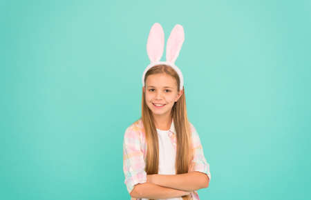 Child smiling play bunny role. Happy childhood. Traditions for kids to help get in easter spirit....