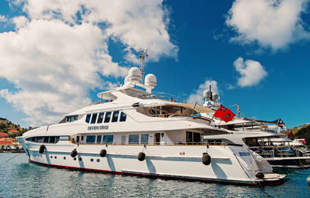 Gustavia, st.barts - January 25, 2016: yachting, luxury travel on yacht. Yachts anchored at sea pier...