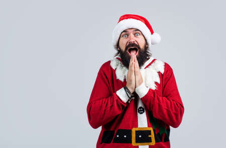 Are you ready. cheerful bearded man in santa claus costume. brutal hipster celebrate xmas party. winter holiday preparations. present and gift shopping sale. happy new year. merry christmasの写真素材