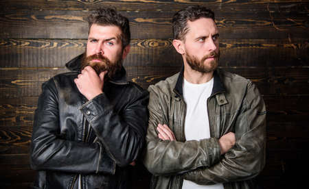 Feel confident in brutal leather clothes. Brutal men wear leather jackets. Men brutal bearded hipster posing in fashionable black leather jackets. Leather fashion menswear. Handsome stylish and coolの写真素材