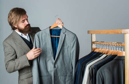 Fashioner man designing formal clothes premium quality, vintage piece conceptの写真素材