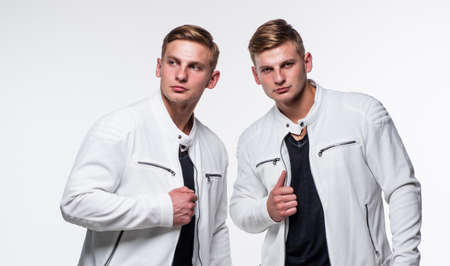 young twin brothers with similar appearance, beautyの写真素材