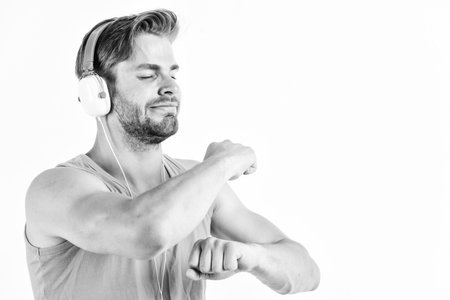 Enjoy perfect music sound headphones. Buy music gadget. Musical accessory. Songs for active leisure. Man listening music headphones and dance white background. Modern technology. Music taste conceptの写真素材