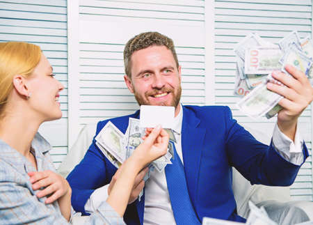 Man business owner sit office pile of money. Bank assistant offer plastic card. Create bank account....