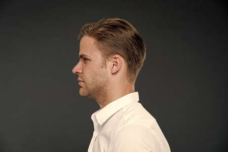 barbershop services for businessman. businessman at barbershop. hairstyle of businessman after barbershop. barbershop man with formal confident look of businessman. casual business man in profile.の写真素材