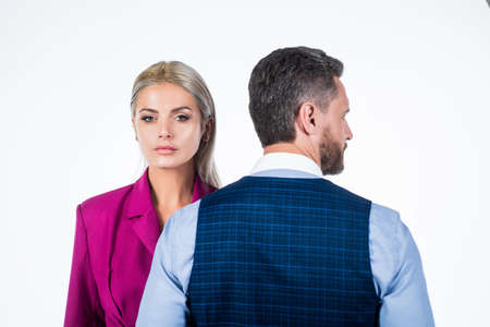 confident business couple in corporate fashion look isolated on white, contradictionの写真素材