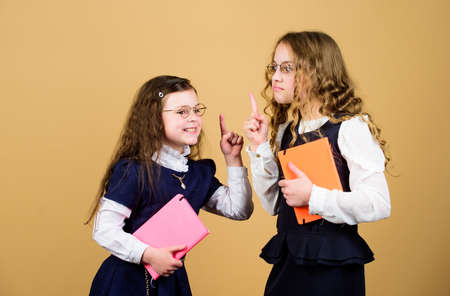 Girls school pupils. Back to school. Knowledge day. Pass exam. Stress causes anxiety. Education is what remains after one has forgotten what one has learned in school. Stressful day at schoolの写真素材