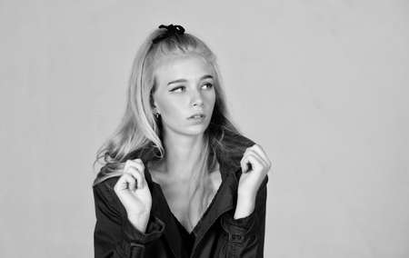 Must have concept. Woman makeup face blonde hair posing coat with collar. Fashionable coat. Clothes and accessory. Girl fashion model wear coat for spring and autumn season. Trench coat fashion trendの写真素材