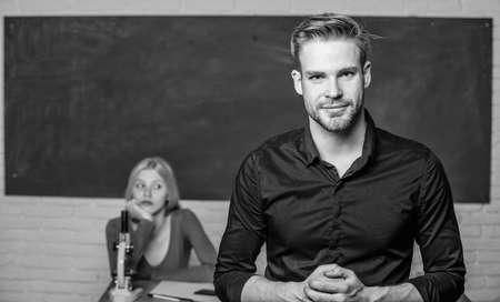 Youth mentoring. Man well groomed attractive teacher in front of classroom. Obsessed with knowledge....