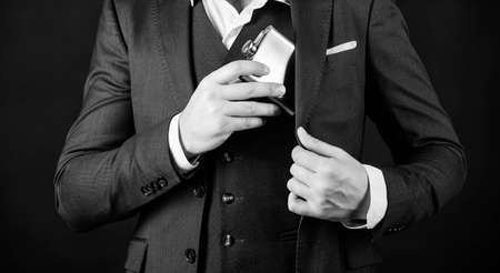 Guy hide metal flask into pocket. Alcohol drink concept. Have alcohol drink with you. Always with...