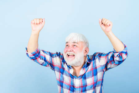 Be your best. mature bearded man in white wig. Hairloss concept. grandfather on retirement. senior man with gray beard. barber and hairdresser. male fashion. health care. happy old granpaの写真素材