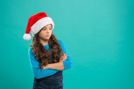 Christmas shopping. New year party. Santa claus kid. Happy winter holidays. Small girl. Present for...