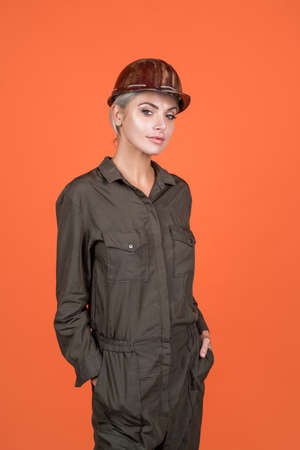 Assistant. female builder in hard hat. building and construction. lady architect workerの写真素材