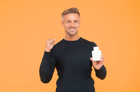 Confident about the way he looks. Confident guy present cologne gesturing with confidence. Skincare cosmetics. Mens grooming. Fragrance and deodorant. Perfume and perfumeryの写真素材