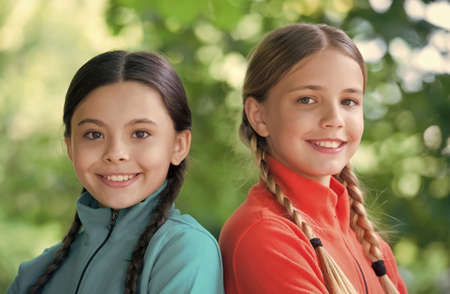 Keep quiet summer is on. Happy girls enjoy summer day. Summer vacation and holidays. Beauty look....