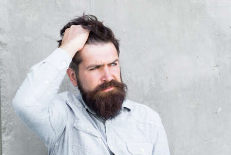 i have a problem. hispter style. headache and overworking. negative emotions. feel bad. Bearded man. Mature hipster with beard. male facial care. male barber fashion care. brutal man with beardの写真素材