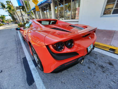 Los Angeles, California USA - March 24, 2021: red Ferrari F8 Tributo luxury sport car back side viewのeditorial素材