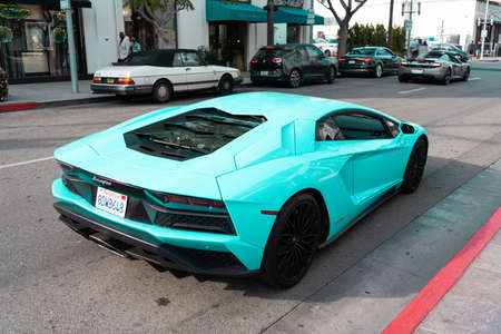 Los Angeles, California USA - April 11, 2021: turquoise Lamborghini Aventador back corner view.のeditorial素材