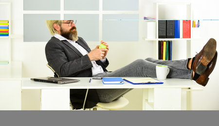 If you want to succeed, you have to take action. Successful man entrepreneur formal business suit sitting office interior. Business manager relaxing. Brainstorming. Office job. Business conceptの写真素材