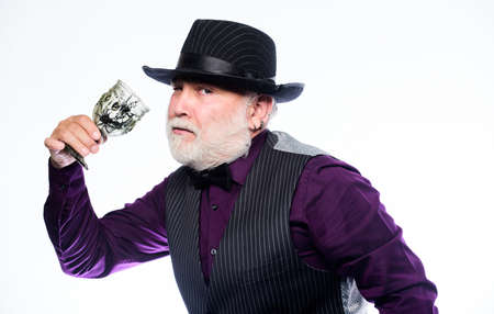 have a fright. halloween holiday costume. barman make cocktail for halloween party. mature man magician in witch hat. evil wizard cooking magic potion with spider. happy halloweenの写真素材