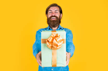Shocked and happy. bearded man ready for holiday. sale and discount. mature hipster with beard hold...