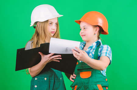 school project. Happy children. Labor day. 1 may. Little kids in helmet with tablet. Foreman...