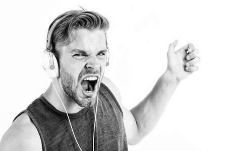 Man handsome dj using modern headphones. Professional musical software and devices. Cheerful dj full of energy. Entertainment concept. Music drives him dance. Equipment for dj. Start this partyの写真素材