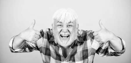 Barbershop hairdresser haircut. Grey hair. Typical grandpa. Emotional mature hipster. Sincere grandparent. Beard and facial hair care. Elderly people. Bearded man with white hair wear checkered shirtの写真素材