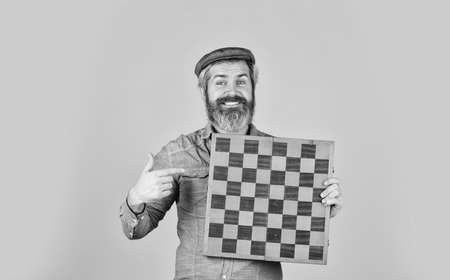 Grandmaster experienced player. Enjoy tournament. Game strategy concept. Chess lesson. Cognitive development. Chess competition. Board game. Bearded man play chess. Chess figures. Intellectual gamesの写真素材