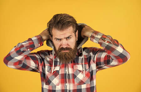pure brutality. well groomed hairstyle. male beauty and fashion look. hipster checkered shirt for bearded guy. unshaven brutal man with beard. hairdresser concept. mature and confidentの写真素材