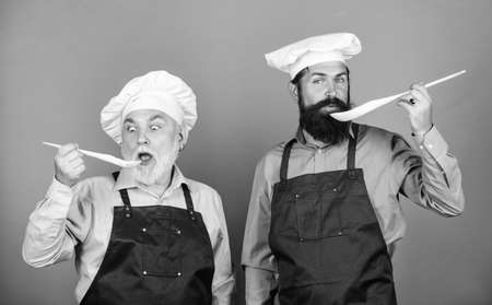 Healthy breakfast. professional restaurant cook. taste food. culinary concept. mature senior bearded men in kitchen. Chef men cooking. cheerful men prepare food. new recipe. Perfect tasteの写真素材