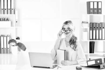 you have a job. Businesswoman typing on laptop at workplace. Confident business expert. modern life. woman in a busy modern workplace. communicating on digital device at home. public relationsの写真素材