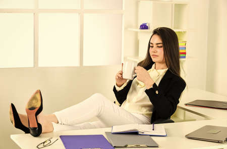 Pretty woman notary at work. Notary concept. My office my rules. Licensed notary is reasonably lucrative. Notaries and notary signing agents manage and witness signatures on official documentsの写真素材