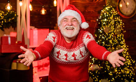 Glad see you. Celebrate new year. Stylish elderly man. Christmas traditions. Stick to traditions. Knitted sweater. Santa Claus. Man senior Santa claus wear sweater nordic pattern. Winter traditionsの写真素材