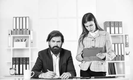 Reconcile data. Boss manager director. Successful business. Man and woman office. Business couple working. Modern business ideas. Consulting. Startup team. Business report. Personal assistantの写真素材