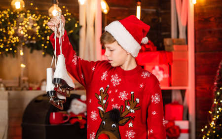 Christmas coming. Christmas mood concept. Santa claus kid. Happy winter holidays. Small boy. Little...