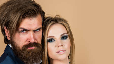 couple in love of bearded man and sexy woman embrace, relationship