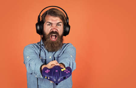 audio game guide. play computer game. new technology in modern life. digital living. hipster with...