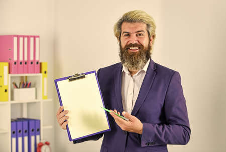 Project Curator. Supervisor inspector controlling. Business people concept. Bearded man making notes. Confident businessman holding documents. Businessman with folder. Control and inspectionの写真素材