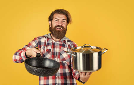 time to eat. kitchen advertising. Man with saucepan. Man hold new brand pan. Shopping kitchenware....