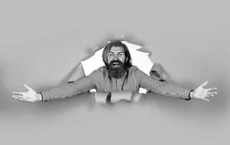 welcome on board. brutal caucasian hipster express happiness. human emotions. unshaven guy with groomed long hair. barbershop and hairdresser. male beauty and fashion. happy bearded manの写真素材