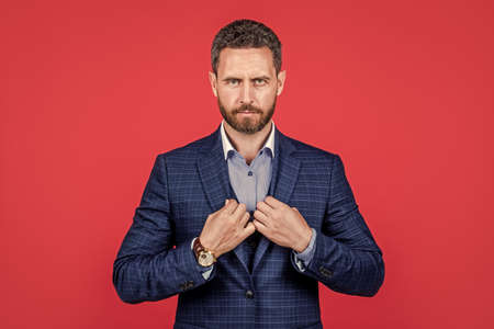 mature smiling guy in suit looking trendy and sexy, male styleの写真素材