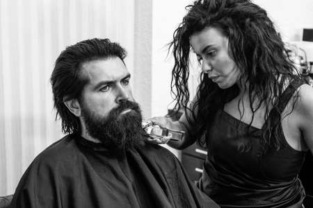 mature hipster with beard at hairdresser. brutal hipster with moustache make new hairstyle....