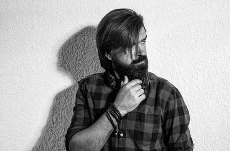 male fashion and beauty. brutal caucasian hipster with moustache. male barber care. confident and...