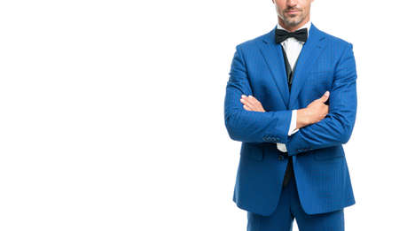 cropped man in bow tie blue suit. businessman isolated on white. gentleman in formalwear. copy spaceの写真素材