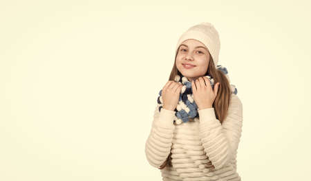 autumn fashion style. warm clothes. copy space. happy teen girl in winter clothes.の写真素材