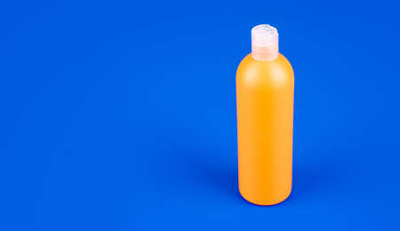 presenting cosmetic product. unbranded shampoo advertisement.の写真素材